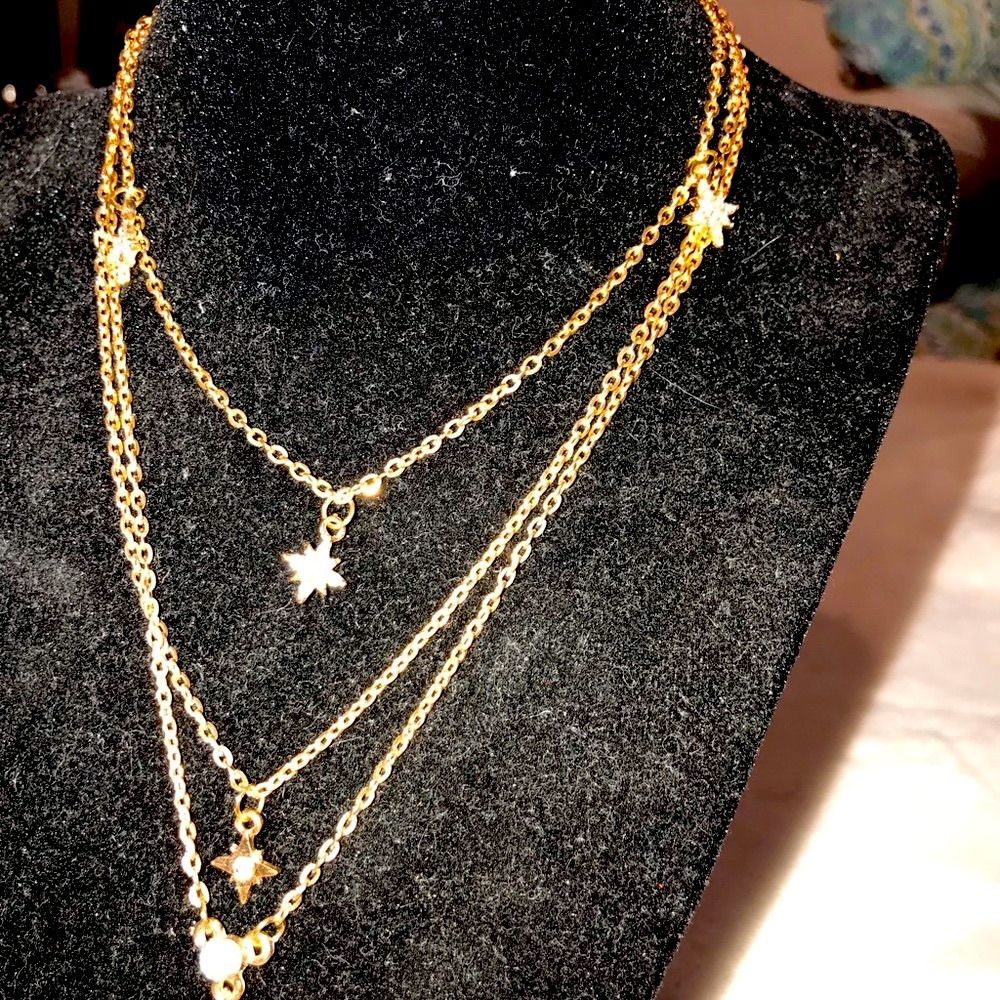 layer, layer, layer gold necklaces Stars